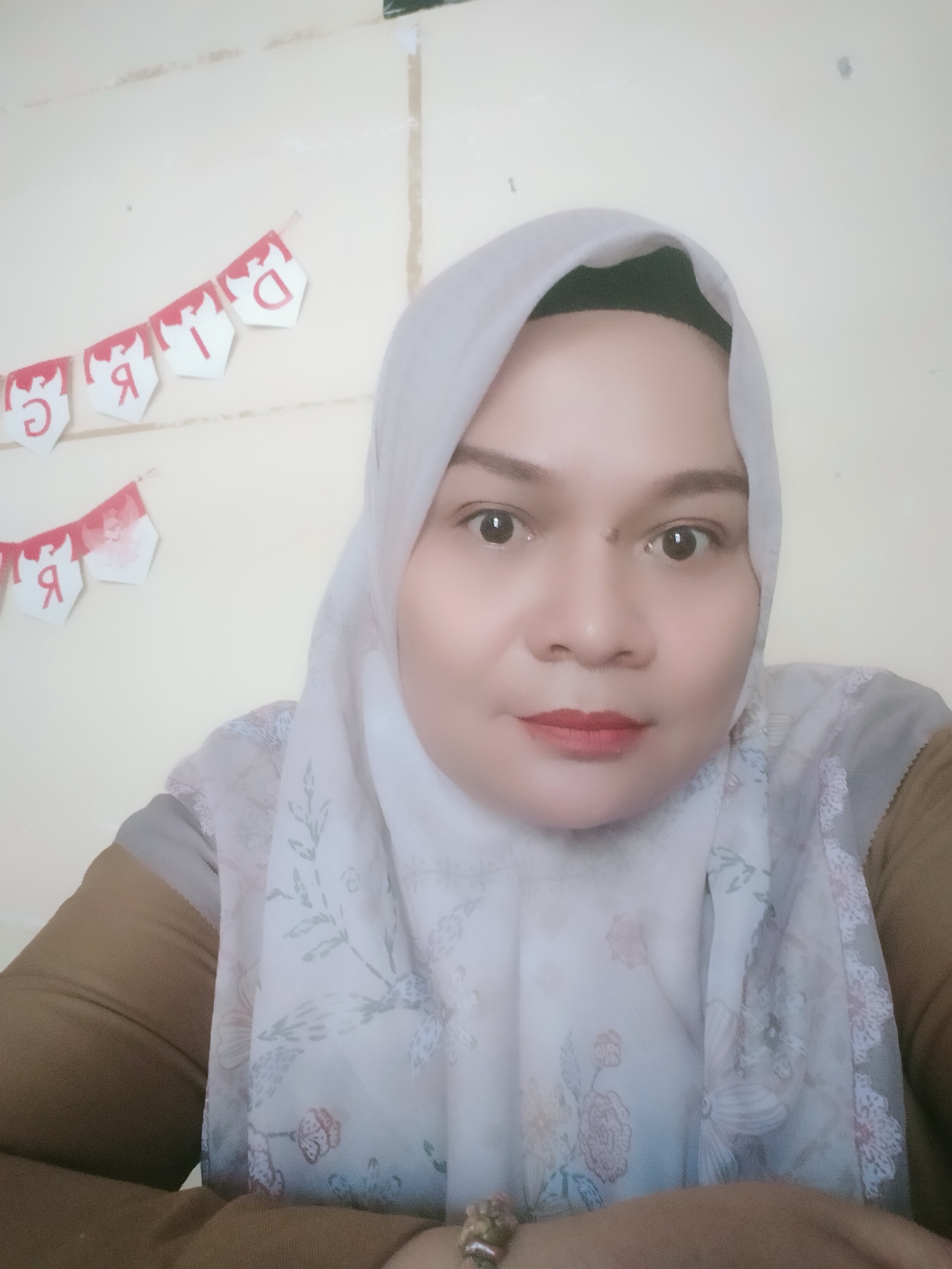 Hj. Odi Tuhfah Z, S.Pd., M.Pd